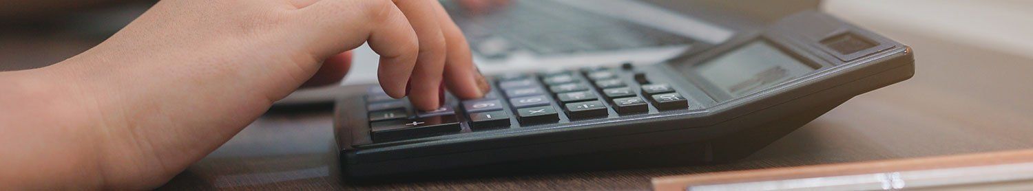 Close up senior employee woman (accounting department) hand press on calculator