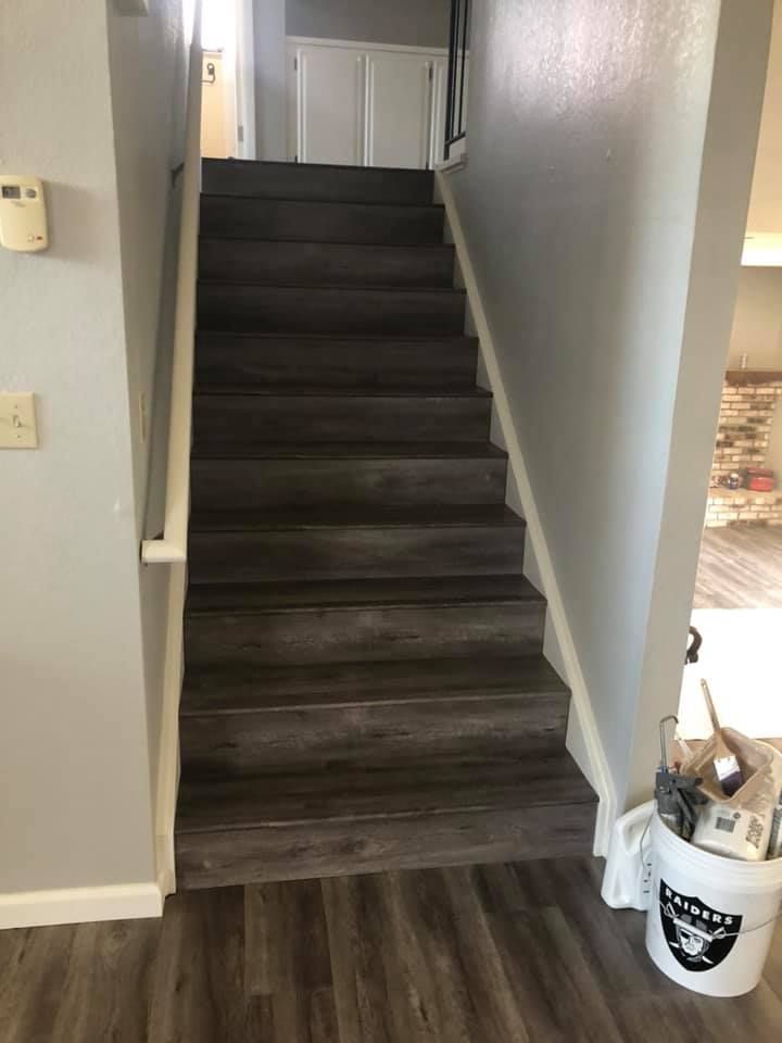 A set of stairs leading up to the second floor of a house.