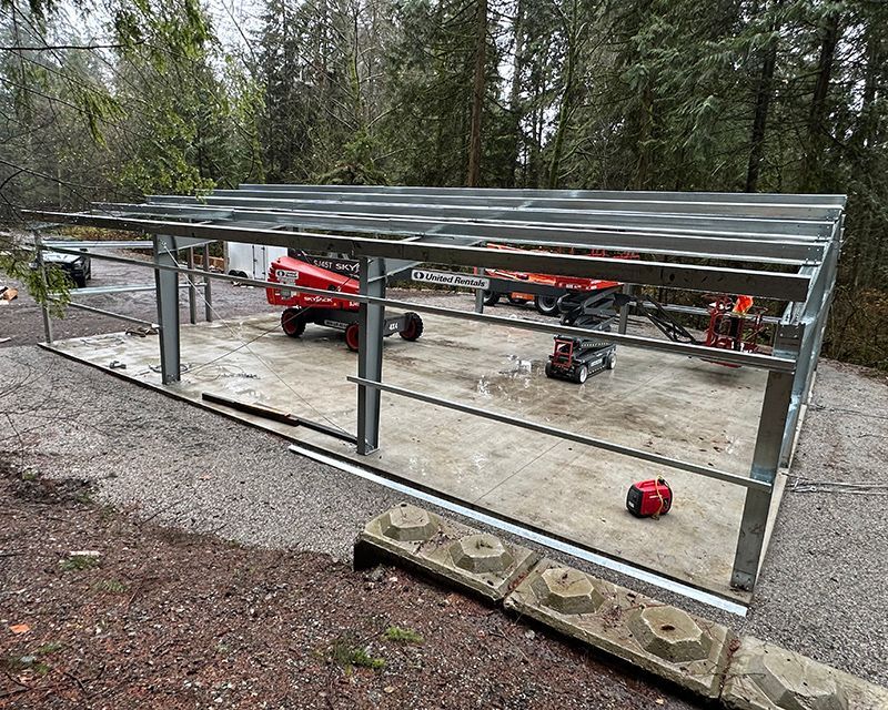 View of steel framing under construction for golf shed in British Columbia