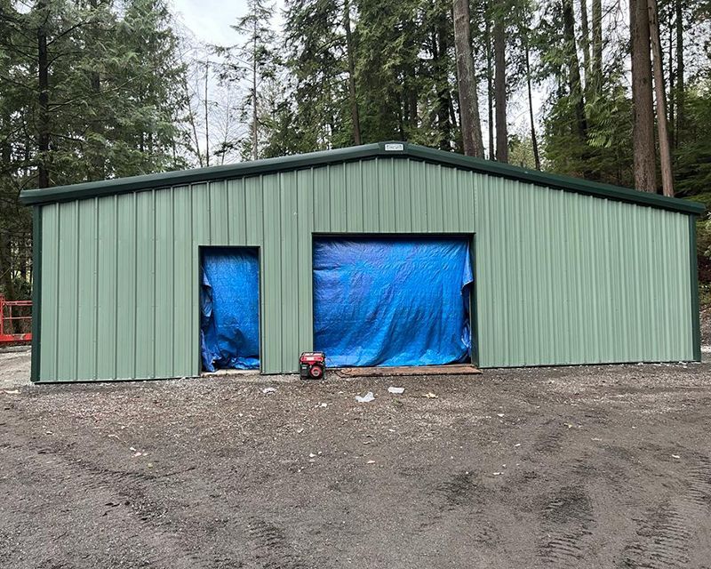 Front view of golf shed under construction at Capilano Golf and Country Club