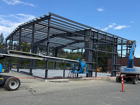 Steel, concrete and muscles are requirements for successful buildings