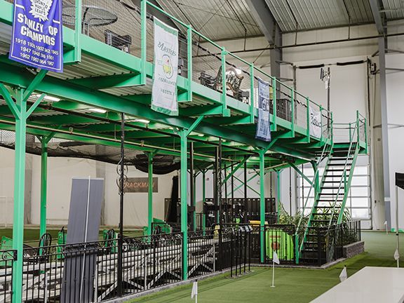 Driving range stands at Metro Golf facility.