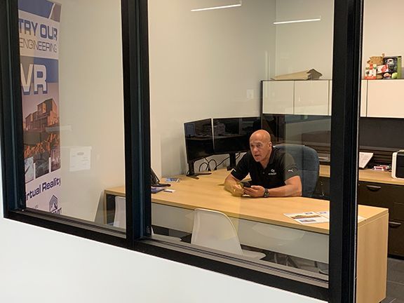 Frank Melo hard at work in the new office.