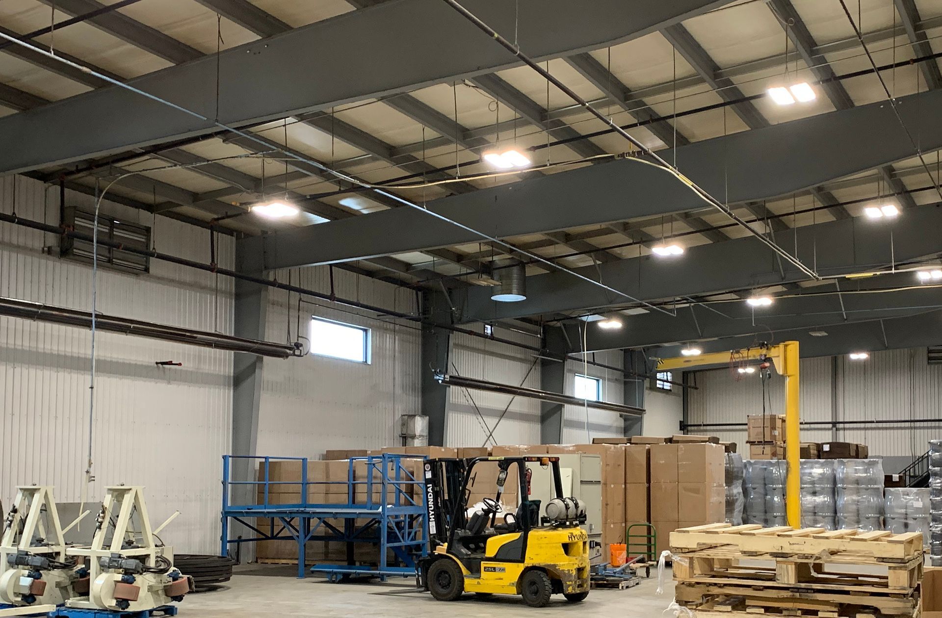 Inside view of rafters and metal roofing system used for an industrial warehouse in London, Ontario.