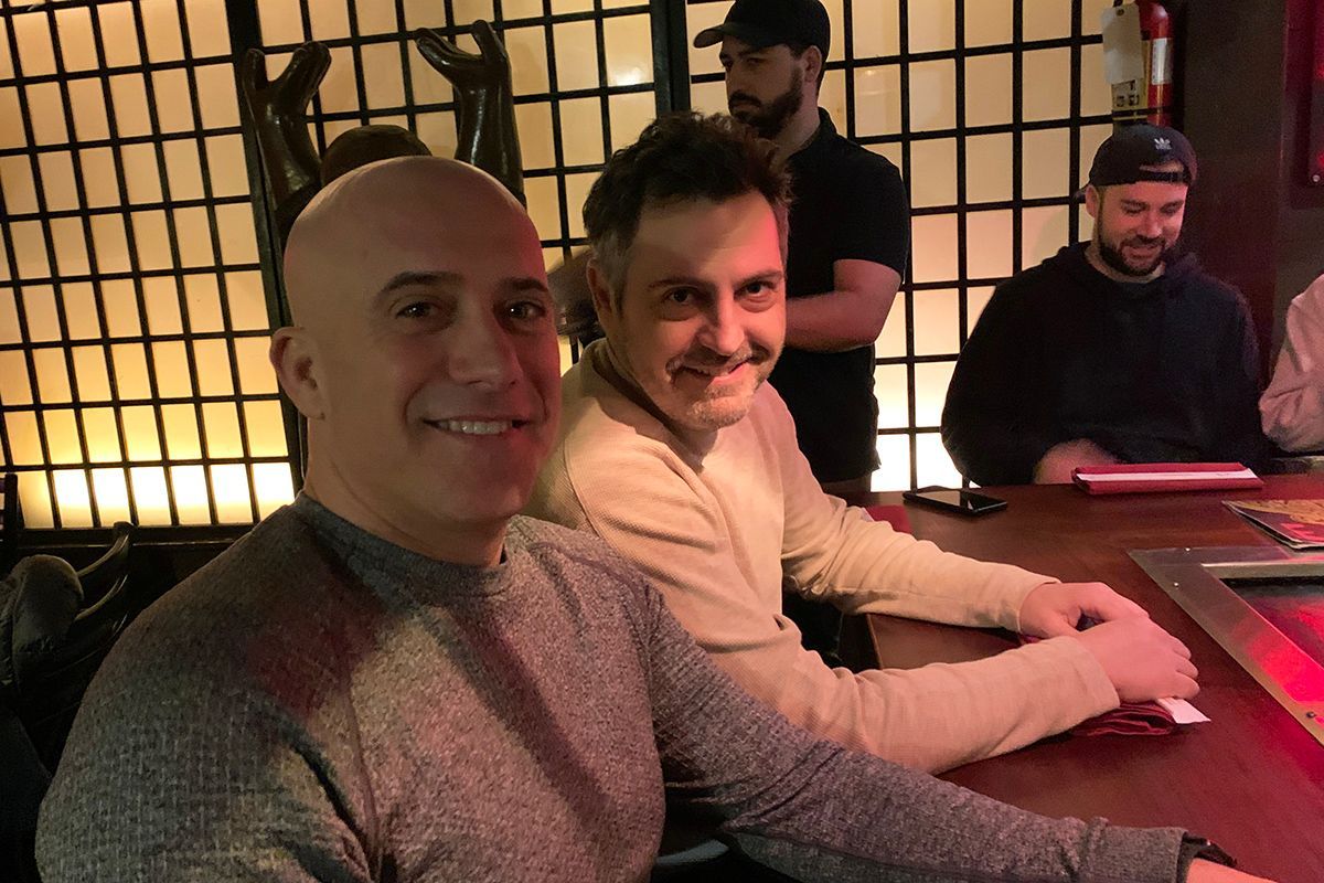 Frank Melo and Darren Sperling take team out for dinner after a long day.