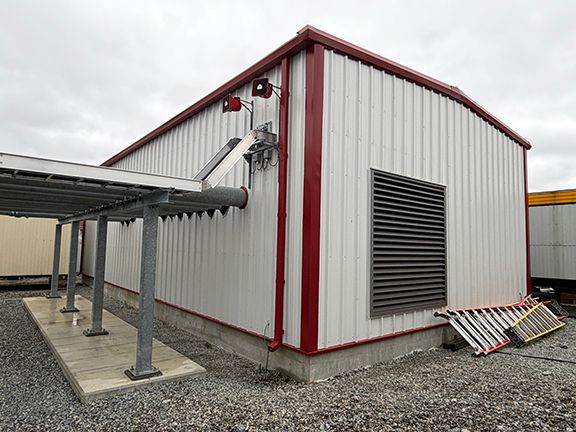 Full view of Vancouver airport jet fuel pump building showing lines in and out.
