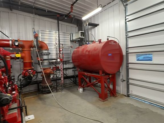 Interior view of pumps and equipment of Vancouver airport building construction.