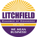 The logo for the litchfield chamber of commerce says `` we mean business ''.
