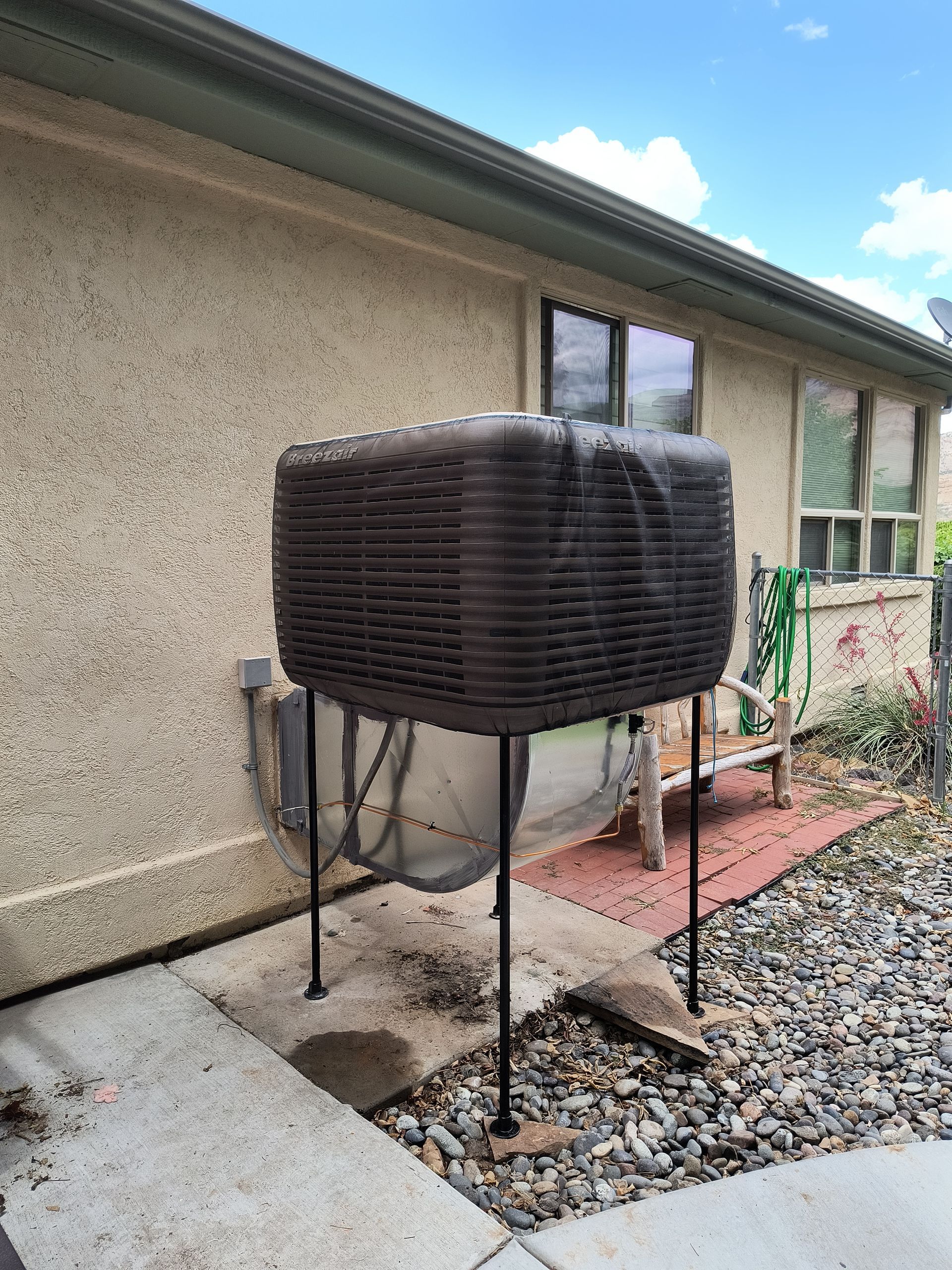 An evaporative cooler installation in Parachute, CO with Extra Mile Services