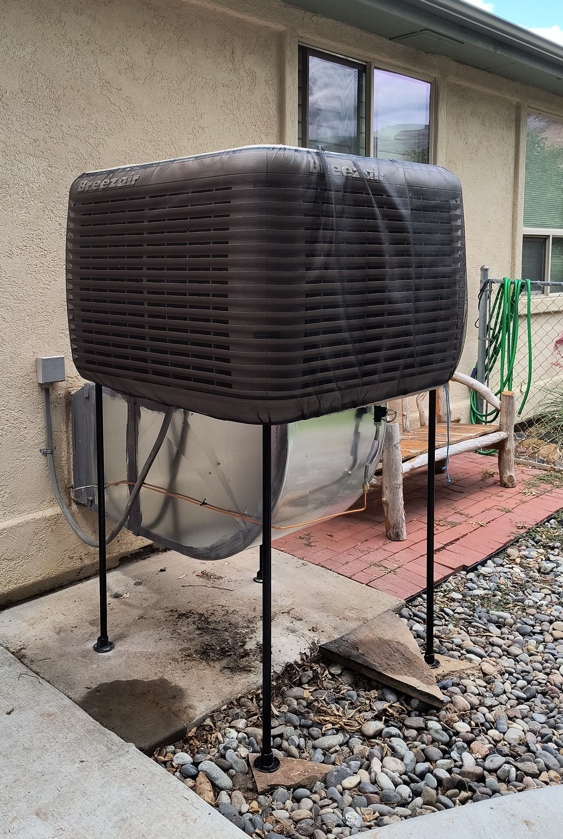 An evaporative cooler installation in Parachute, CO with Extra Mile Services