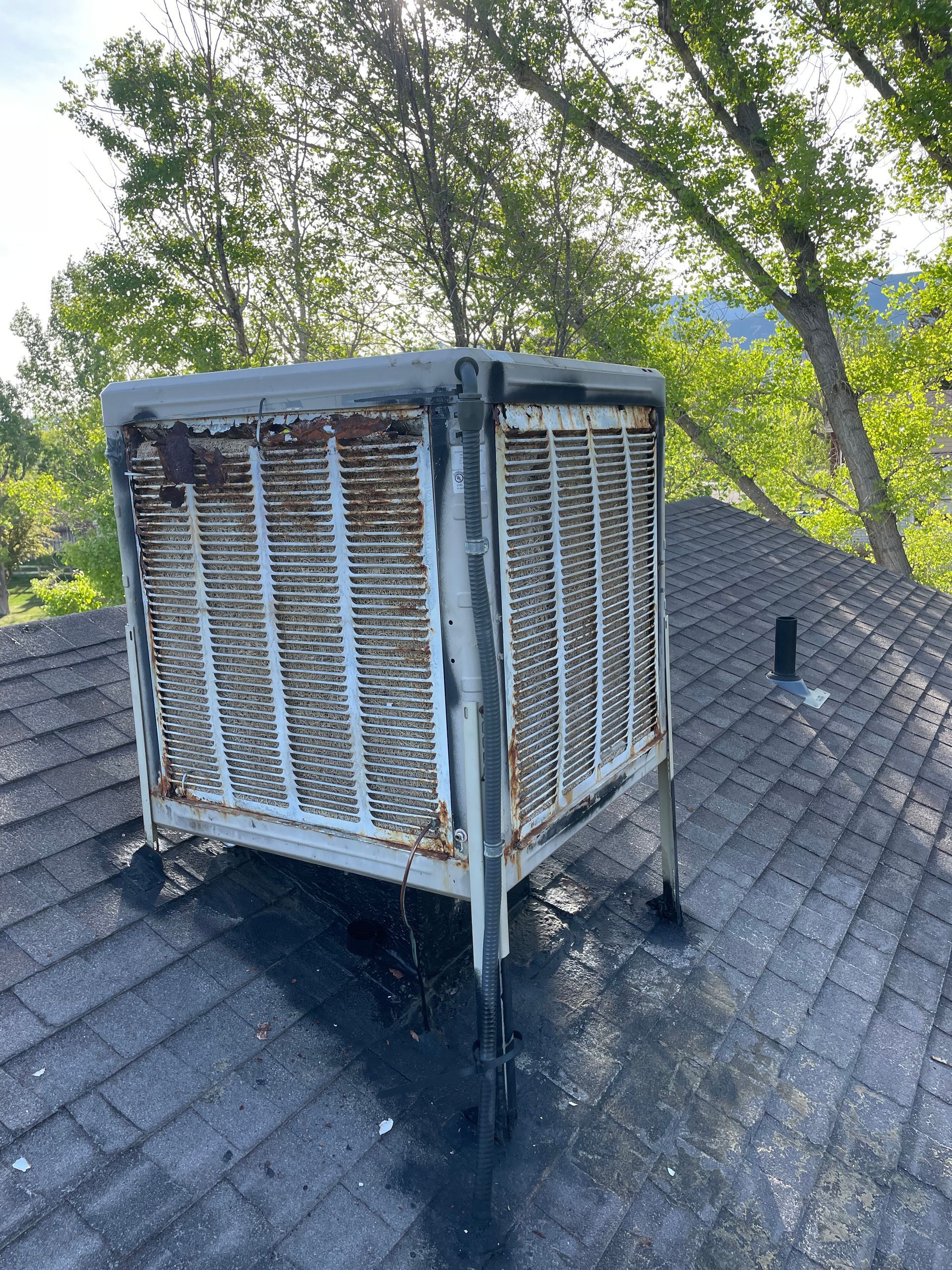 An evaporative cooler replacement in Parachute, CO with Extra Mile Services