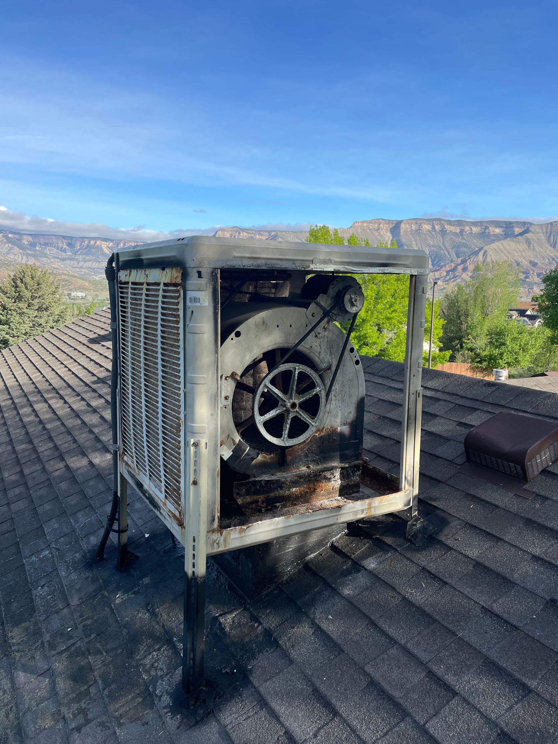 An evaporative cooler replacement in Parachute, CO with Extra Mile Services