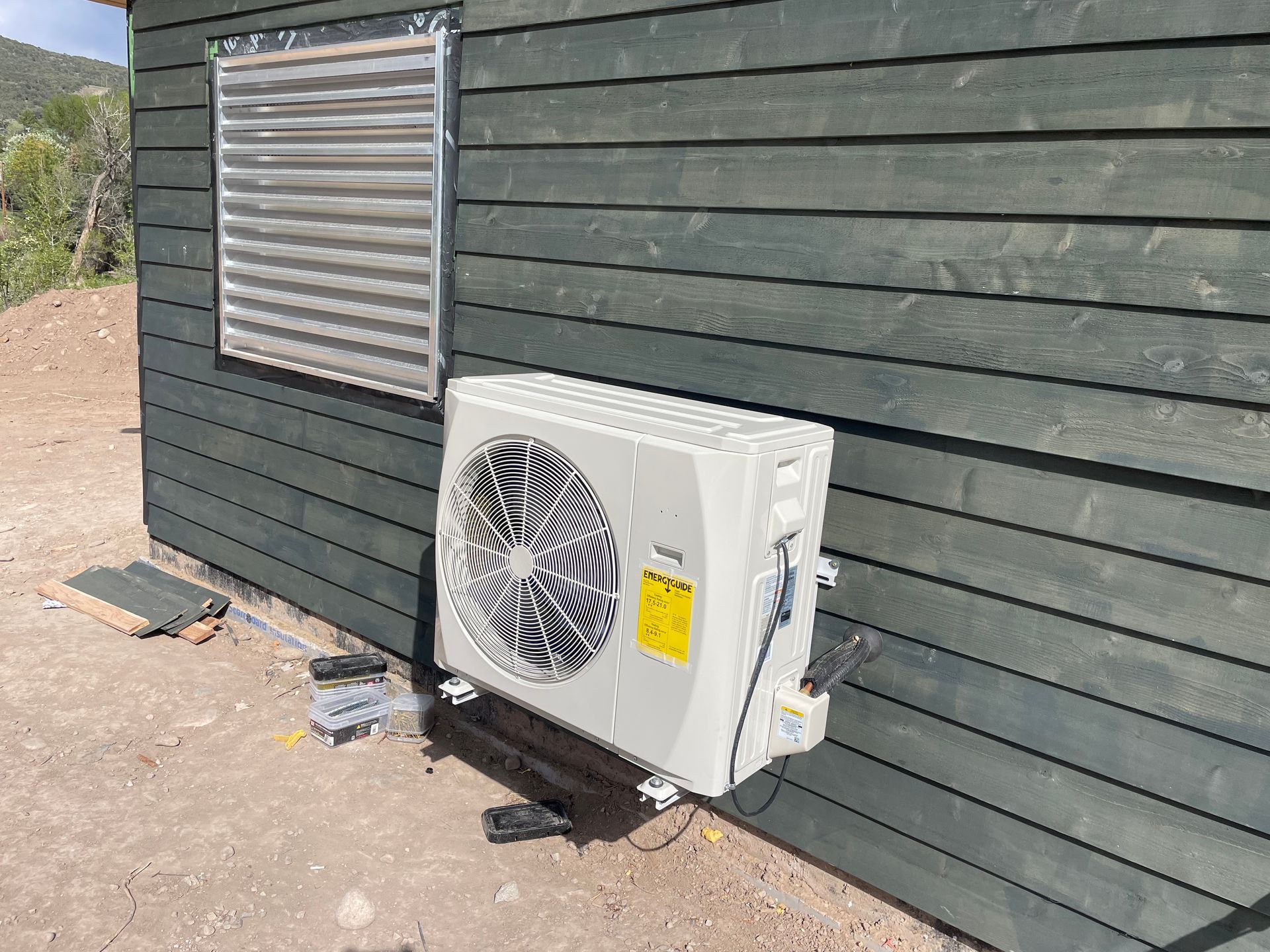 An evaporative cooler replacement in Parachute, CO with Extra Mile Services