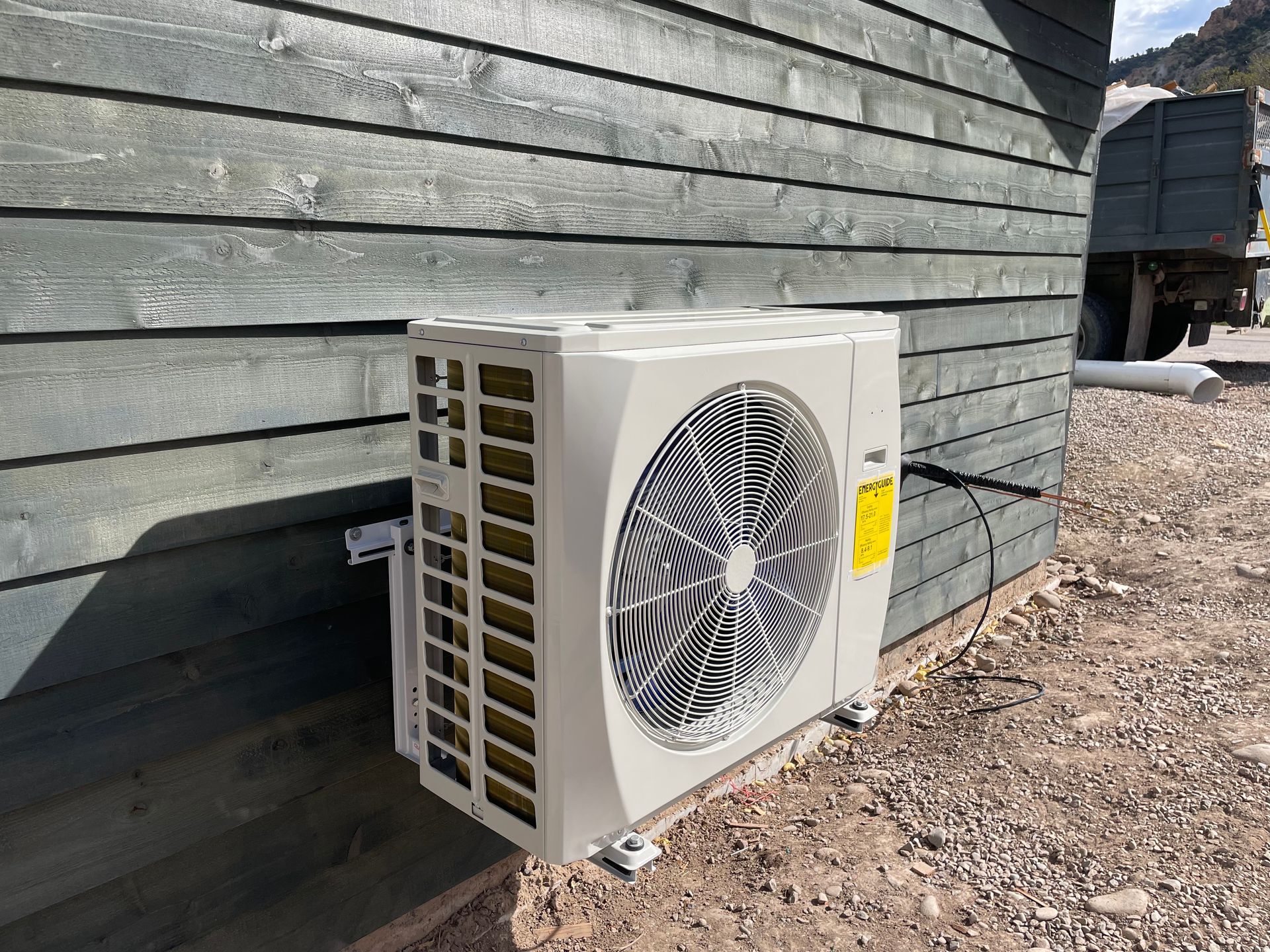 An evaporative cooler replacement in Parachute, CO with Extra Mile Services
