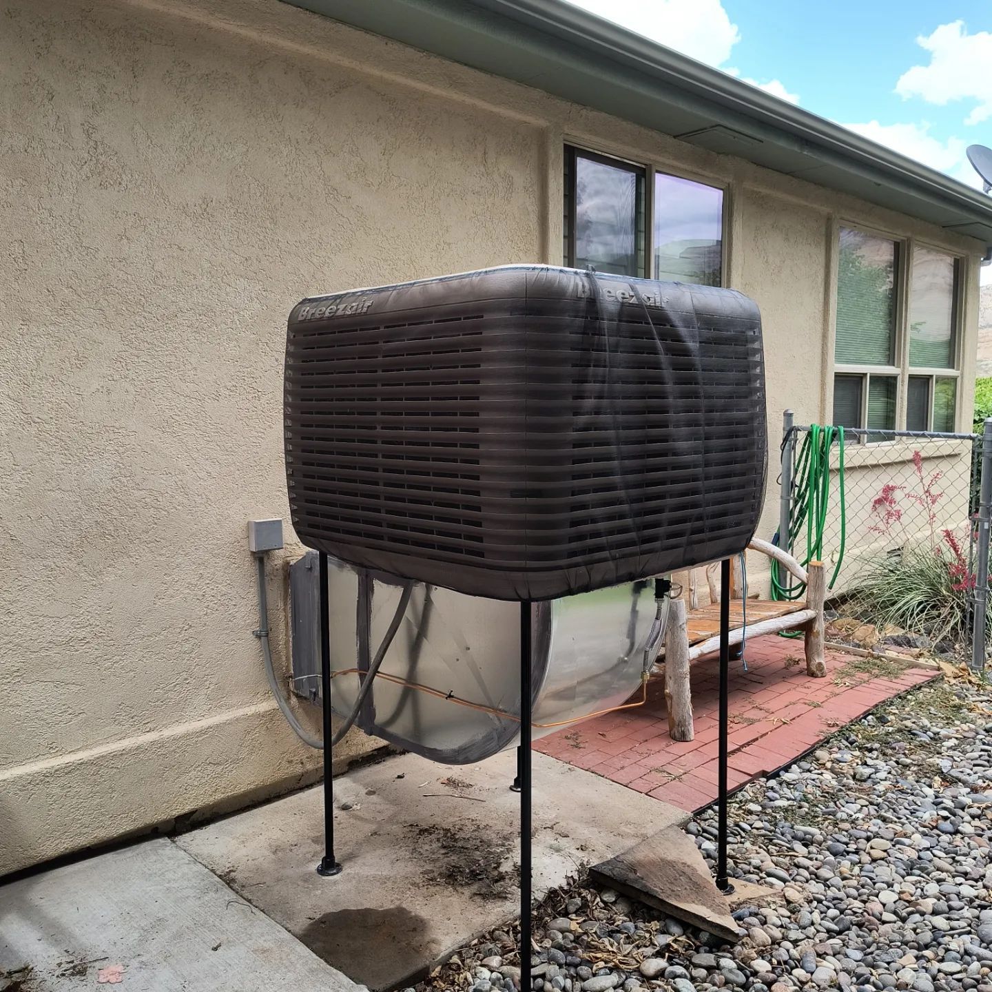 An evaporative cooler installation in Parachute, CO with Extra Mile Services