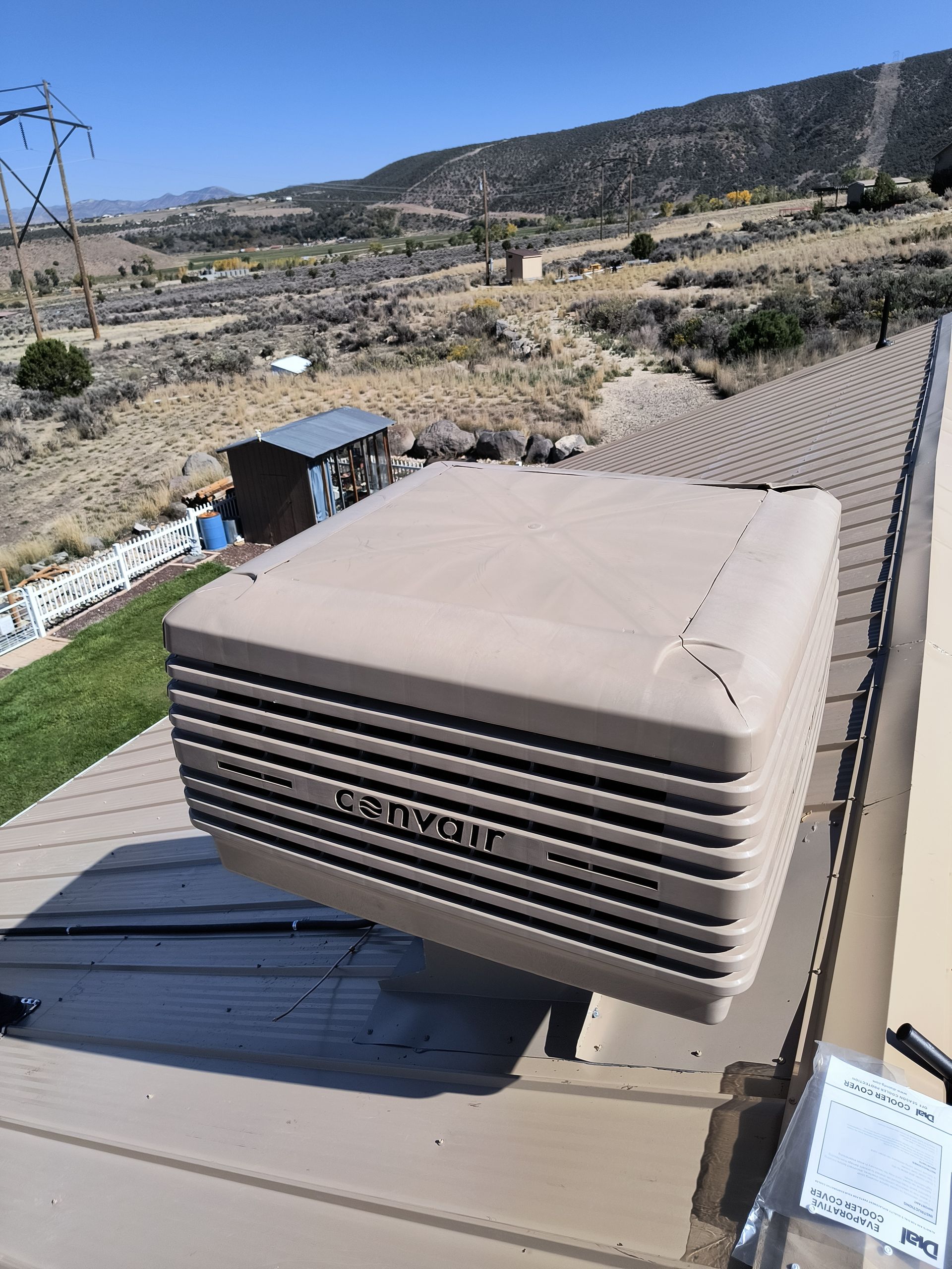 An evaporative cooler replacement in Parachute, CO with Extra Mile Services