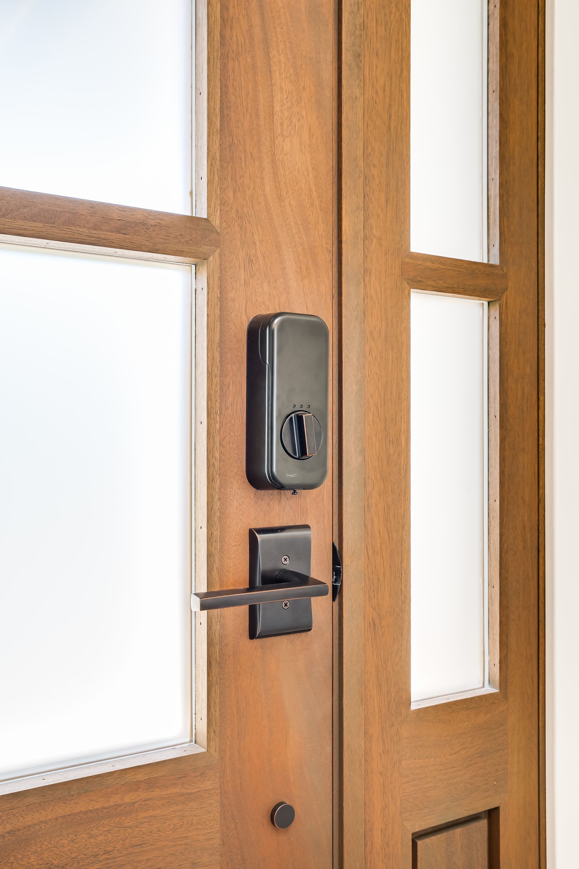 A close up of a wooden door with a lock on it.