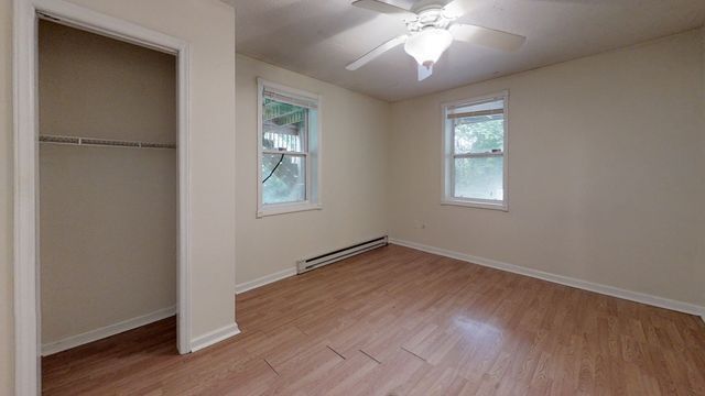 Junaluska Cabin -Living room with fan