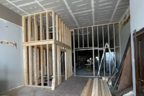 A room under construction with a lot of wooden frames