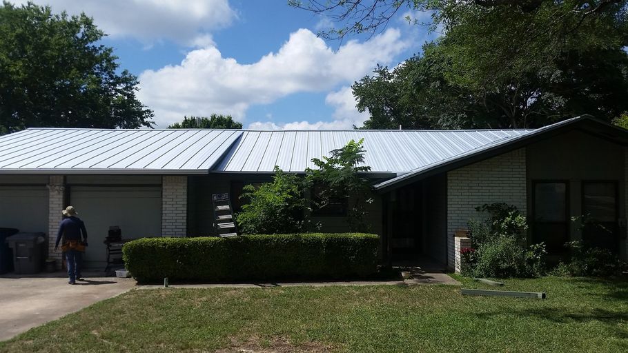 24 Gauge Standing Seam Single Lock - Color is Galvalume by Austin Roofing and Construction