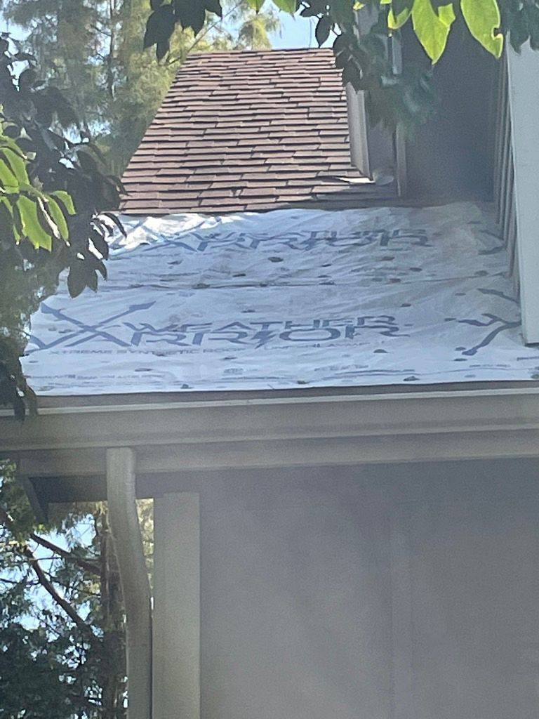 Emergency Roof Tarps by Austin Roofing and Construction