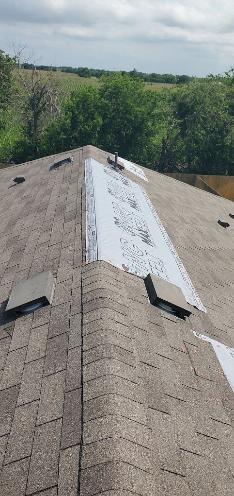 Emergency Roof Tarps by Austin Roofing and Construction