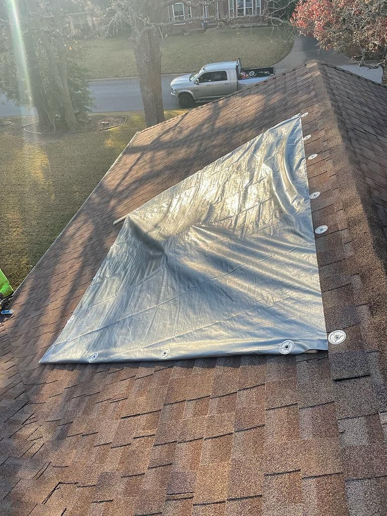 Emergency Roof Tarps by Austin Roofing and Construction