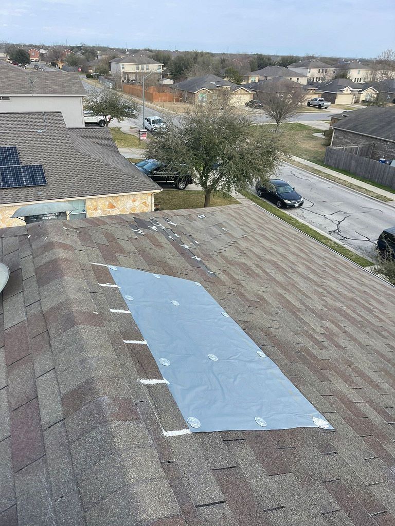 Emergency Roof Tarps by Austin Roofing and Construction