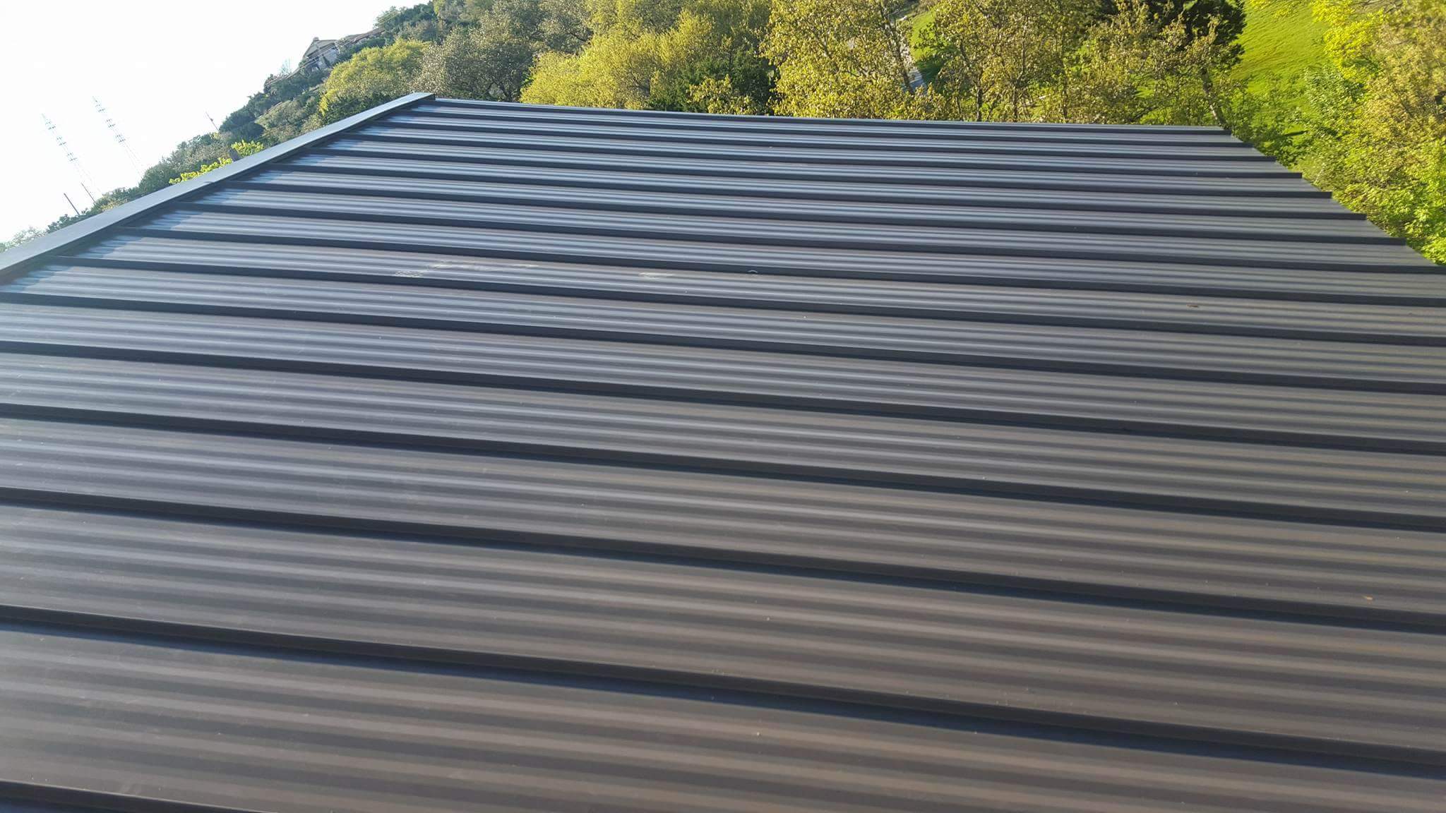 Standing Seam Metal Roof with Striations by Austin Roofing and Construction 512-629-4949