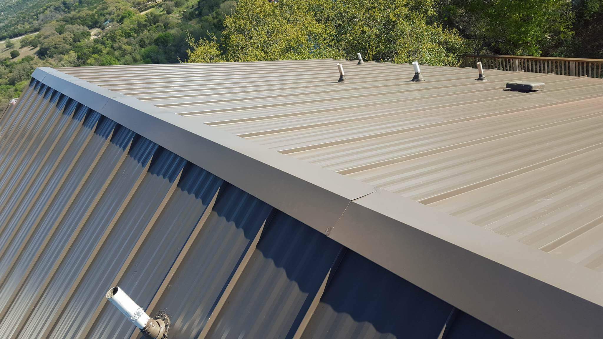 Standing Seam Metal Roof with Striations by Austin Roofing and Construction 512-629-4949