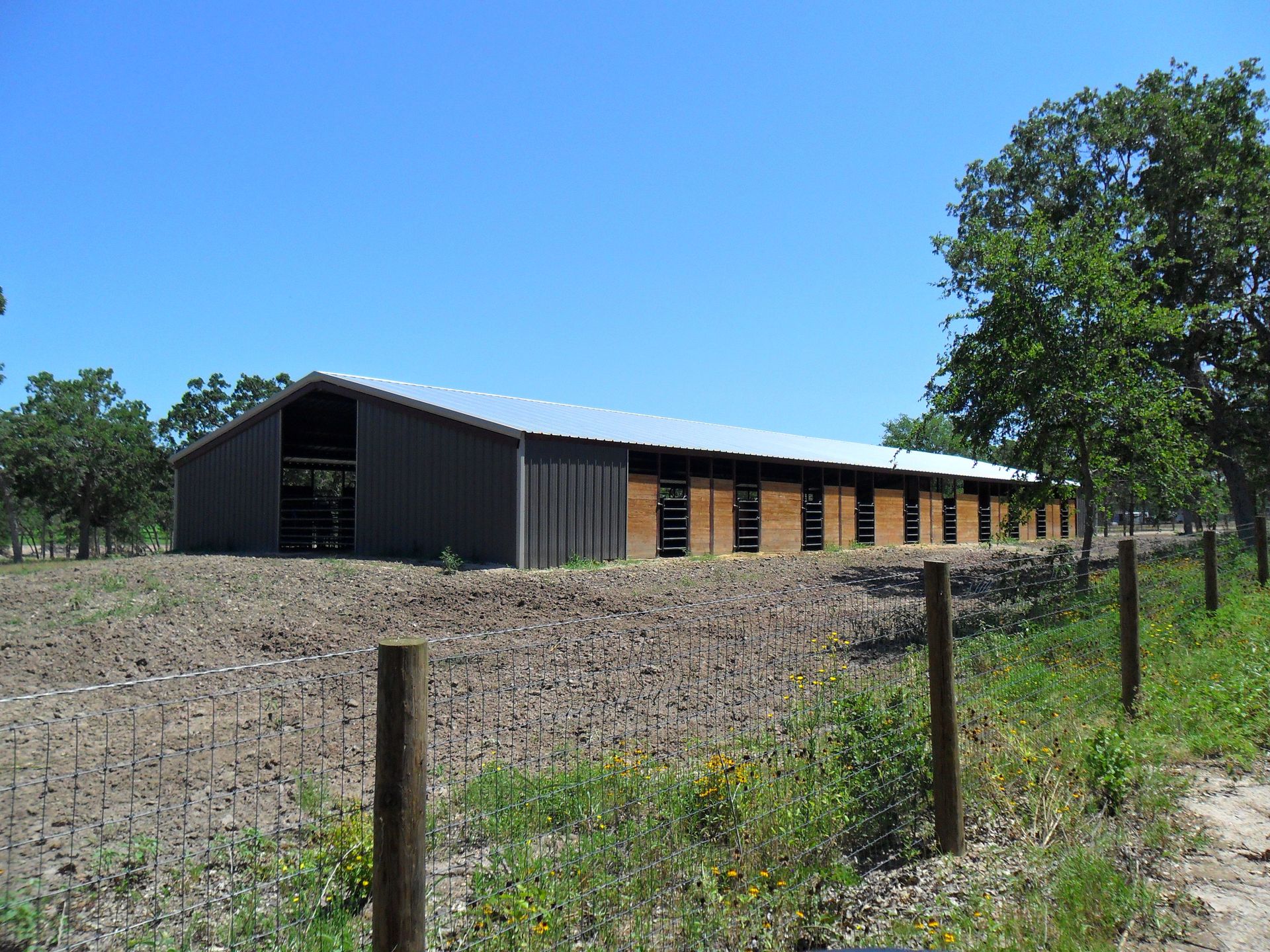 Galvalume Standing Seam Barn Metal Roof  by Austin Roofing and Construction 512-629-4949