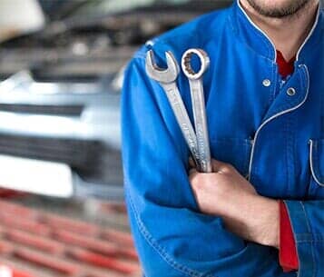 Mechanic Holding Wrench—Auto Repair in Merrillville, IN