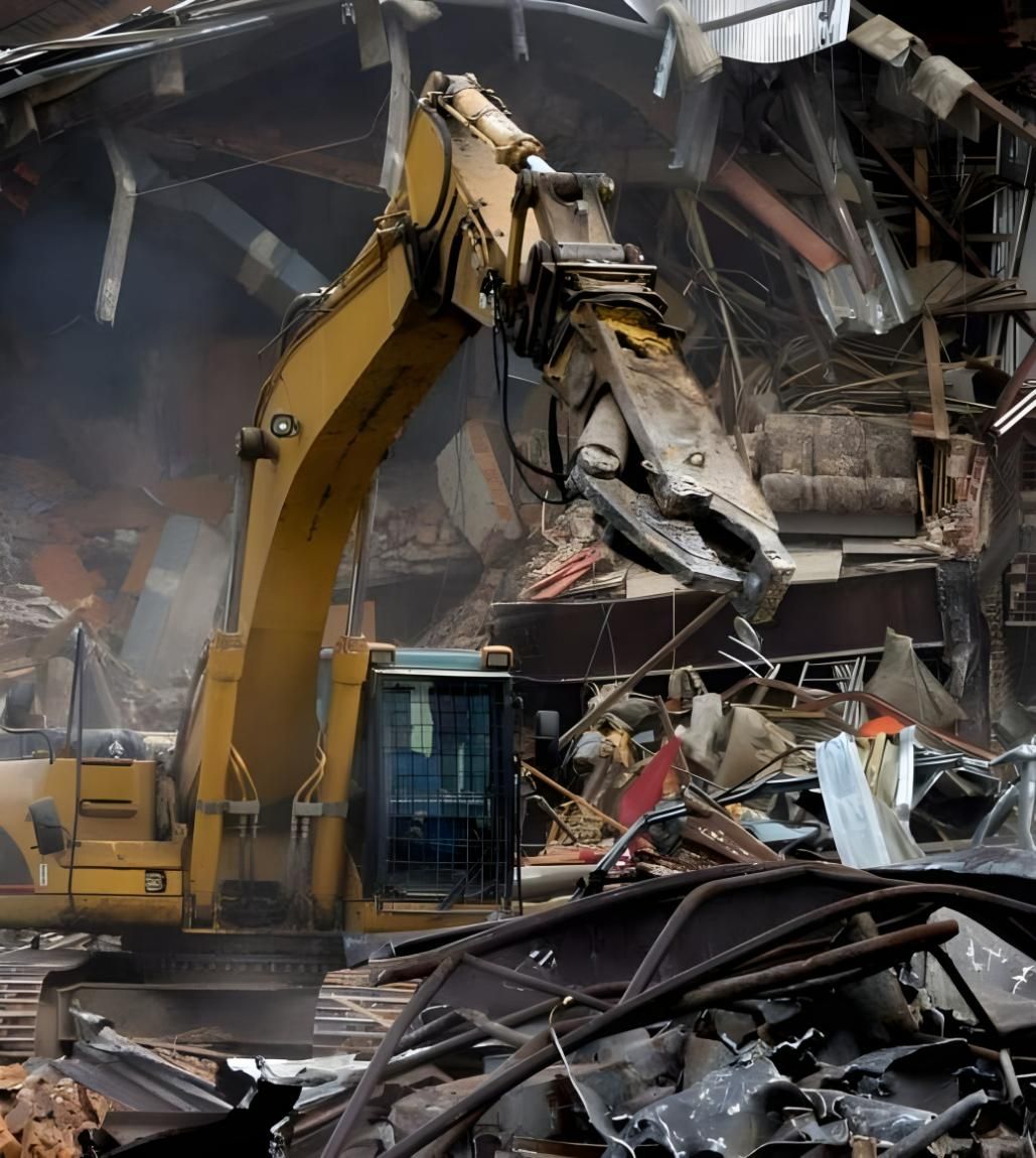 A Large Yellow Excavator is Demolishing a Building — Husky Demolition In Heatherbrae, NSW