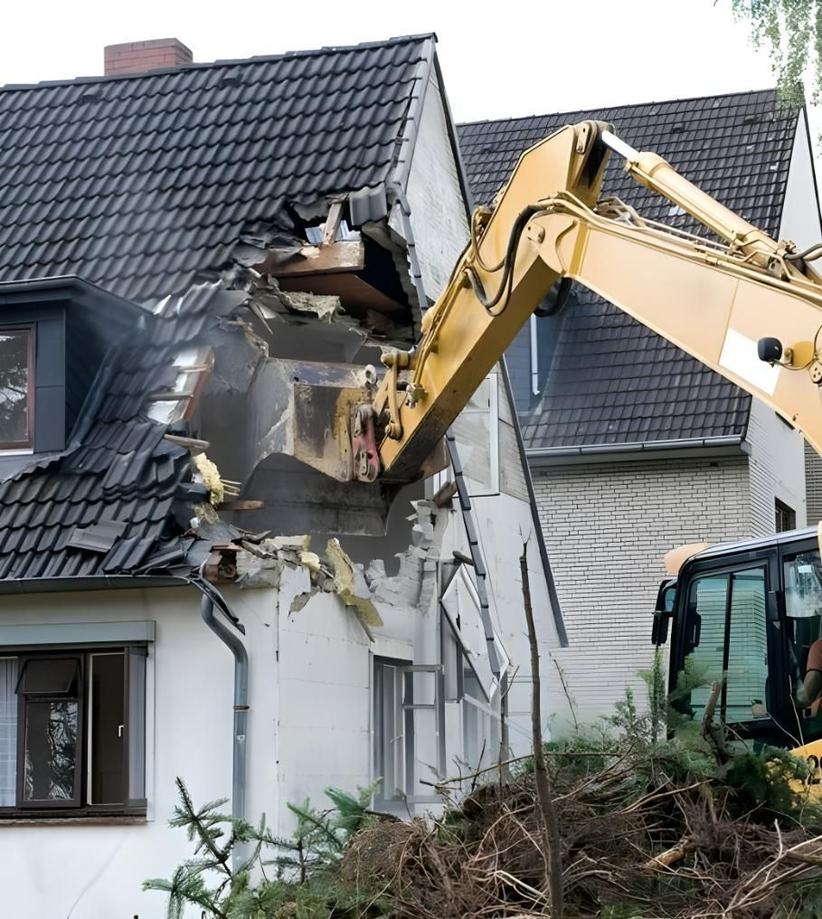 A Yellow Excavator is Demolishing a White House — Husky Demolition In Heatherbrae, NSW