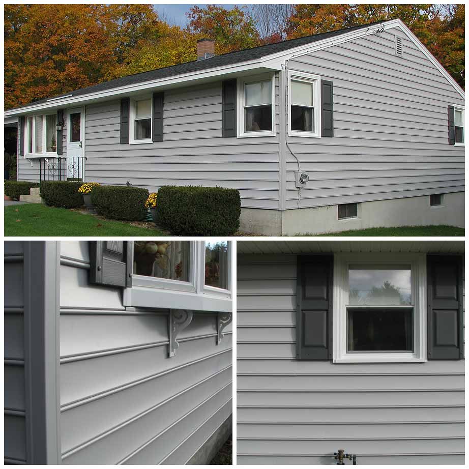 A house with a gray siding and black shutters