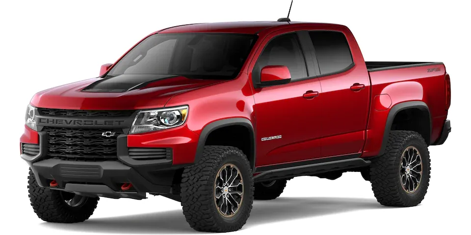 a red chevrolet colorado pickup truck is shown on a white background .