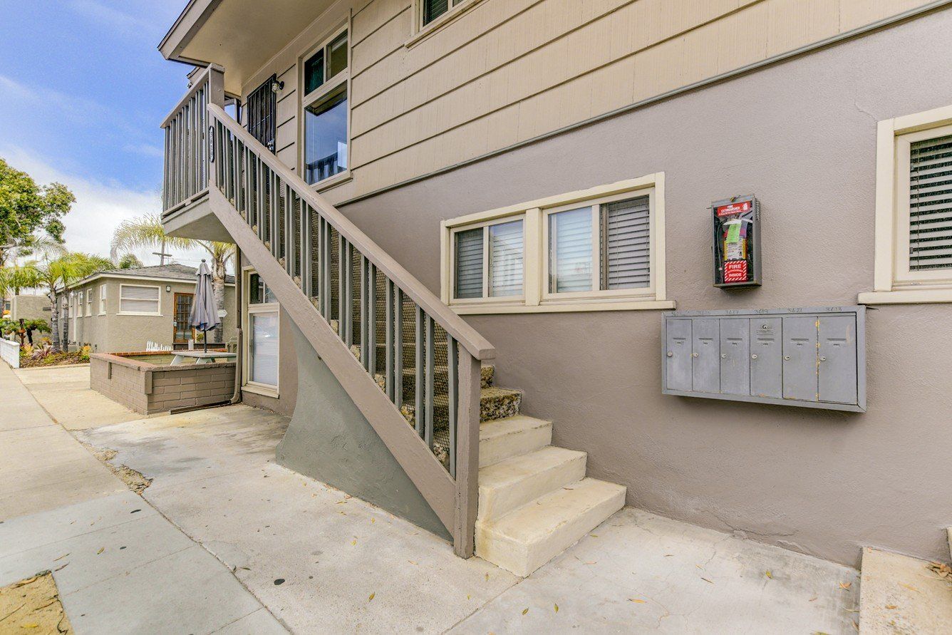 A house with stairs leading up to the second floor