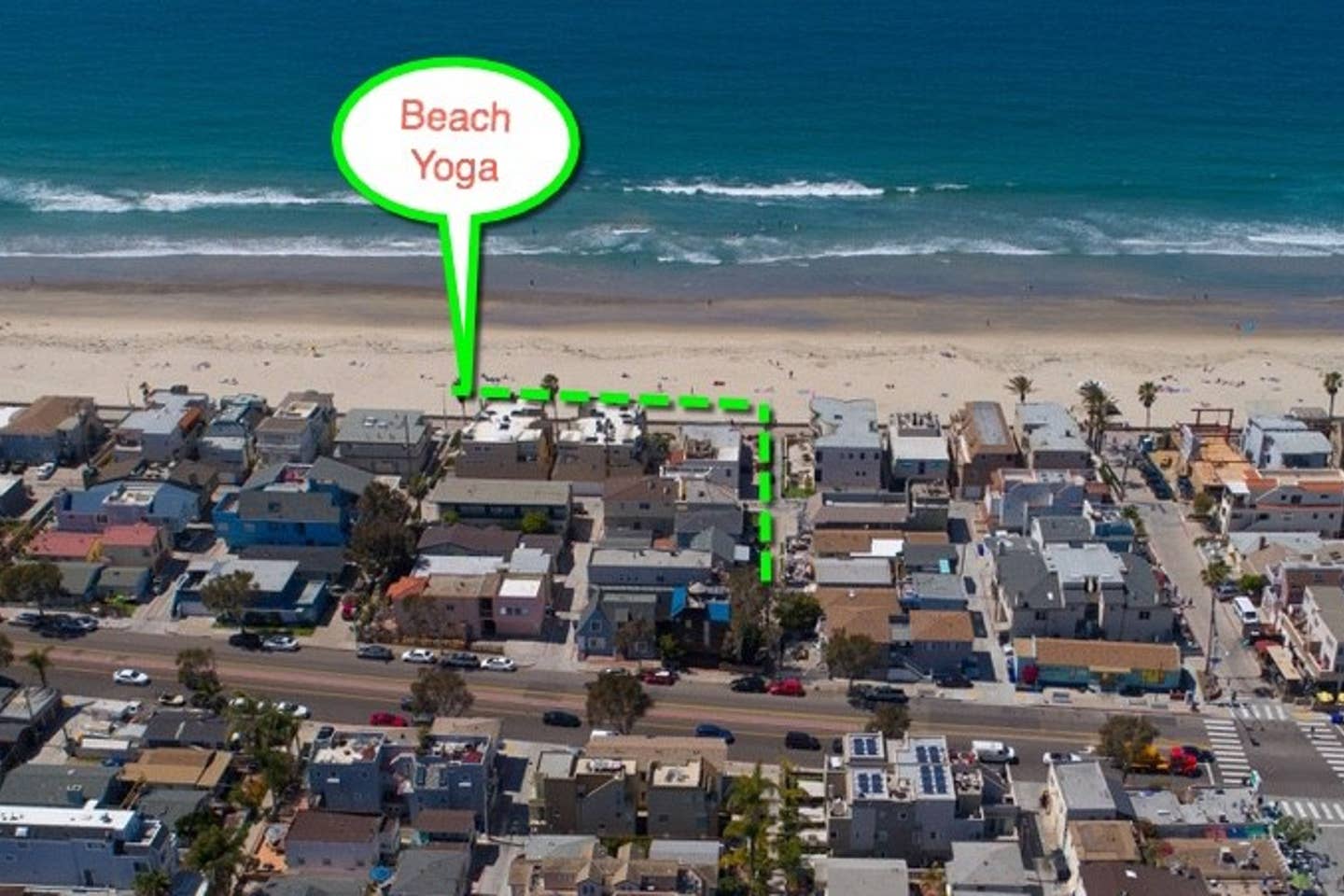 An aerial view of a beach yoga location