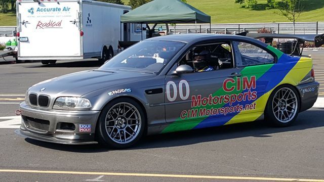 Man Driving Gray Car — Woodbury, NY — CIM Motorsports