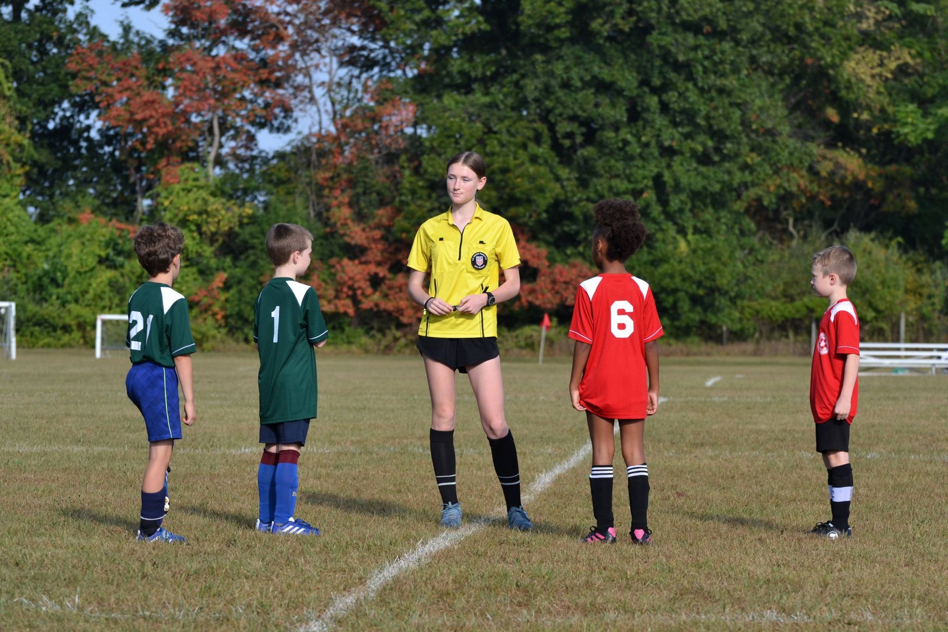 Clarke County Soccer League referee reffing a game.
