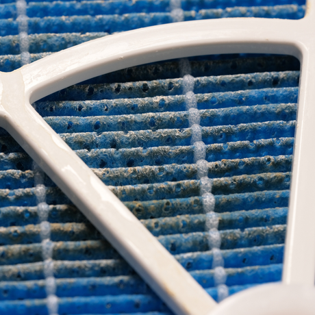 A close up of a blue filter with a white frame