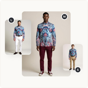 A man is wearing a floral shirt and burgundy pants.
