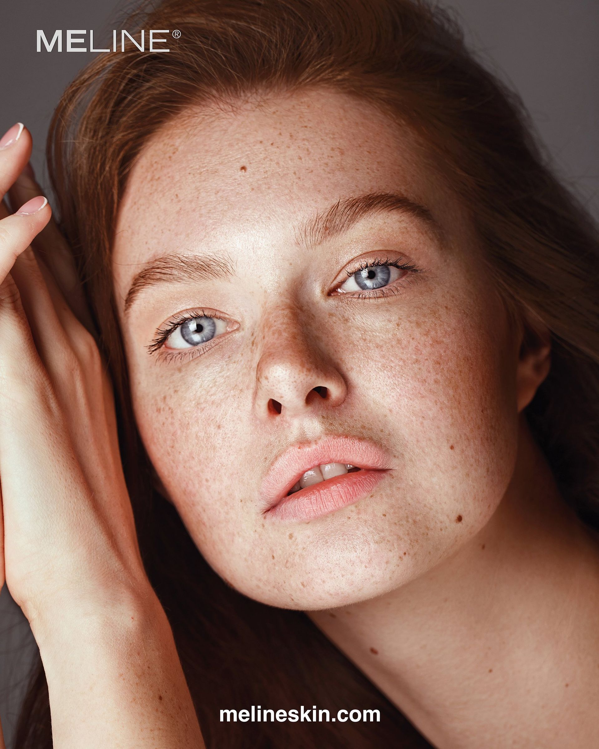Girl with red hair and blue eyes