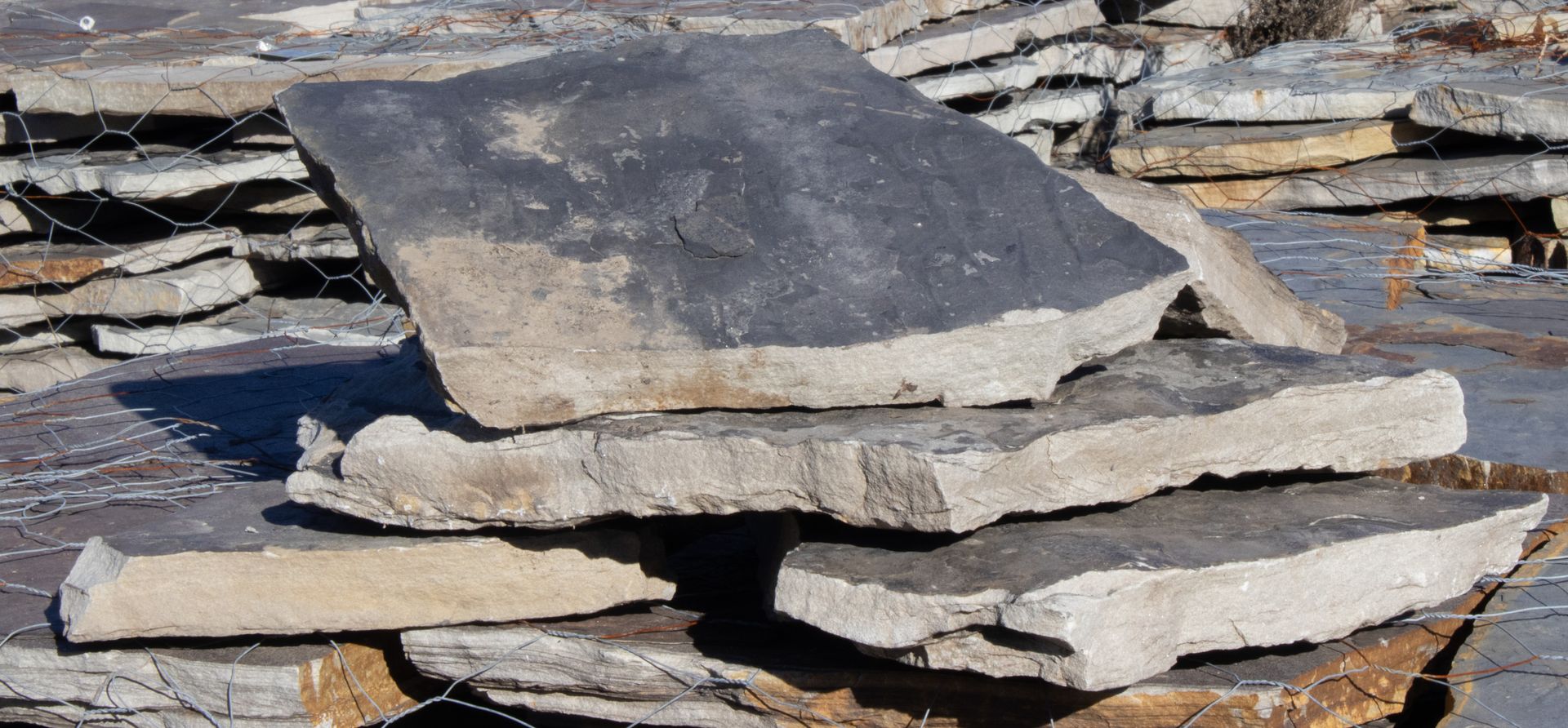 A pile of rocks is stacked on top of each other.