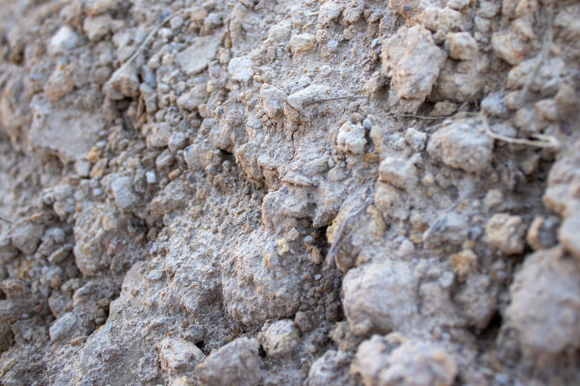 A close up of a pile of dirt and rocks.