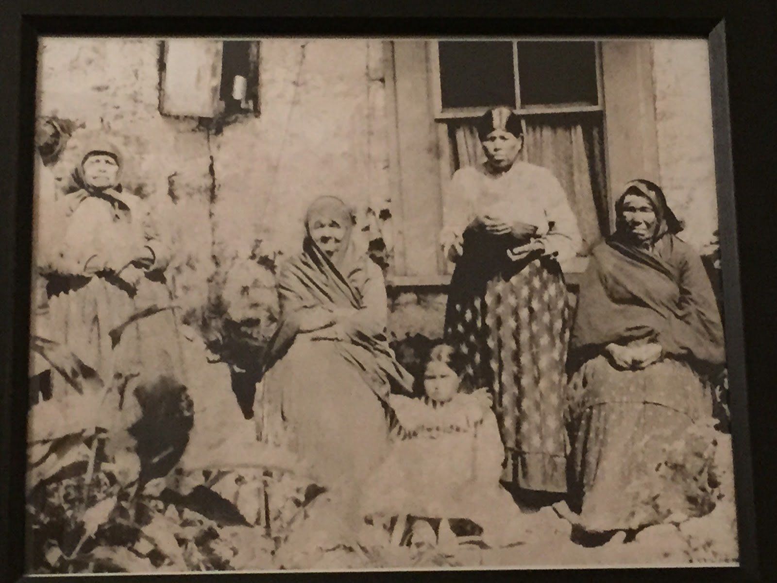 A black and white photo of a group of people