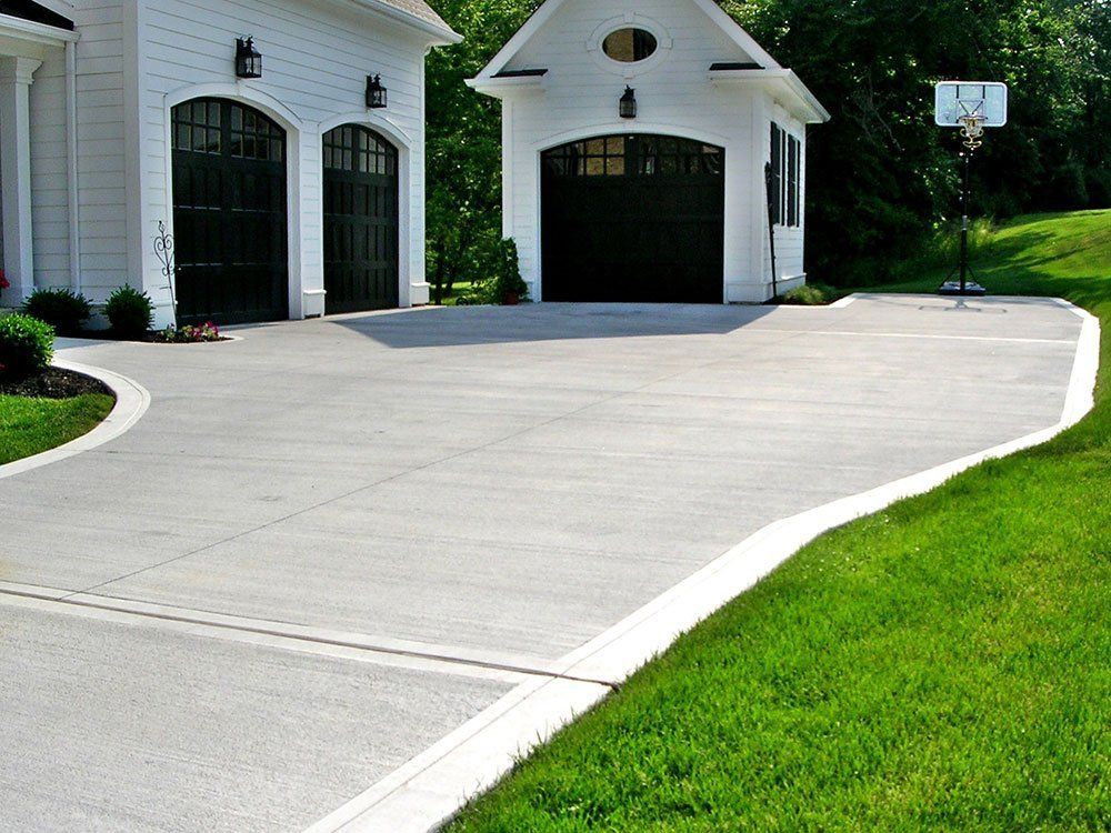 Home with concrete driveway