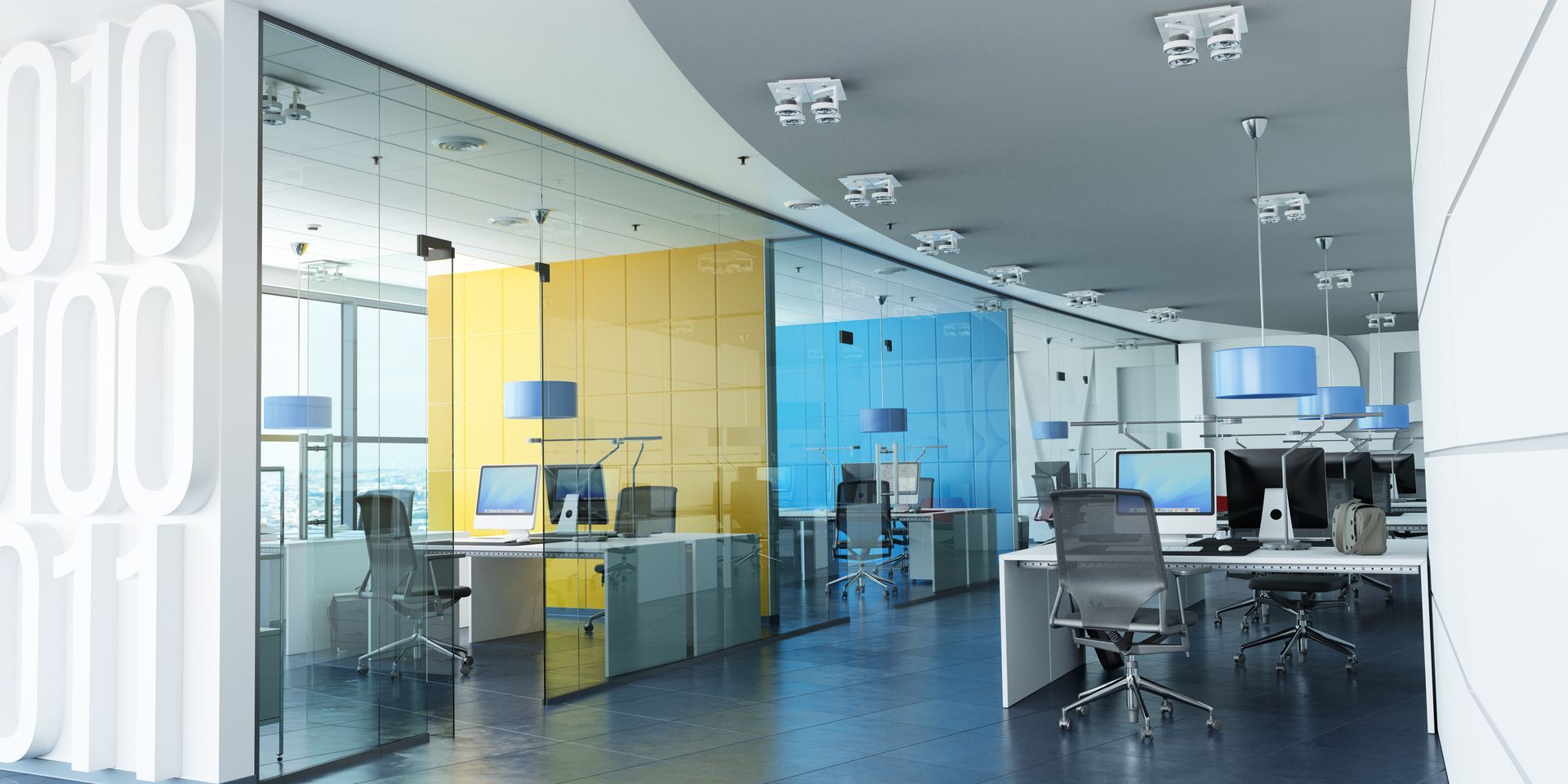 Contemporary office with glass cubicles, desks, and chairs in a bright modern workspace.