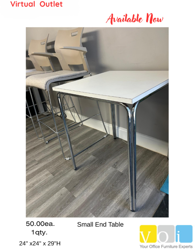 Office cubicle with desk, chair, and file cabinet; neutral colors.