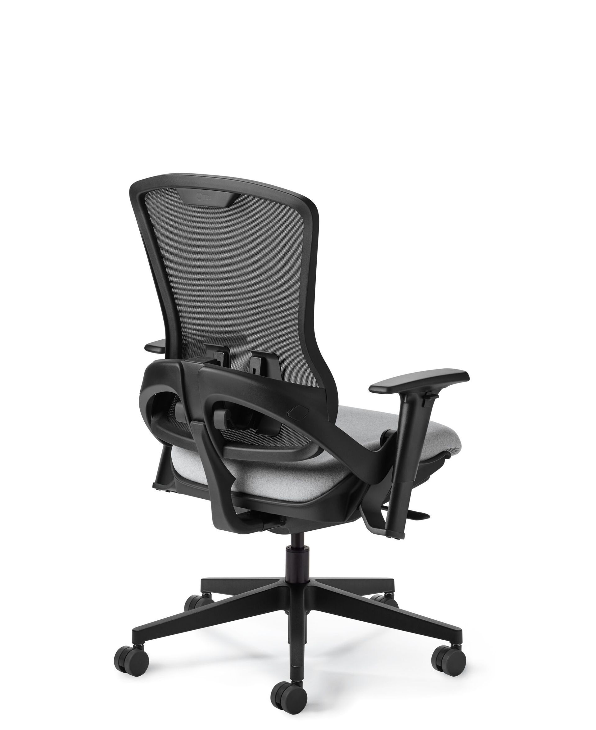 Black mesh office chair with adjustable armrests and a gray seat.